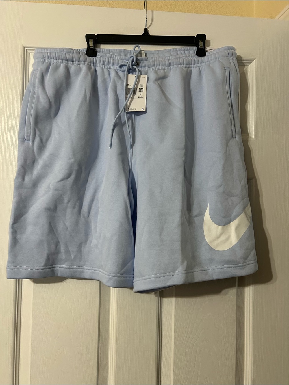 Nike Men’s Light Blue Athletic Shorts with White Swoosh